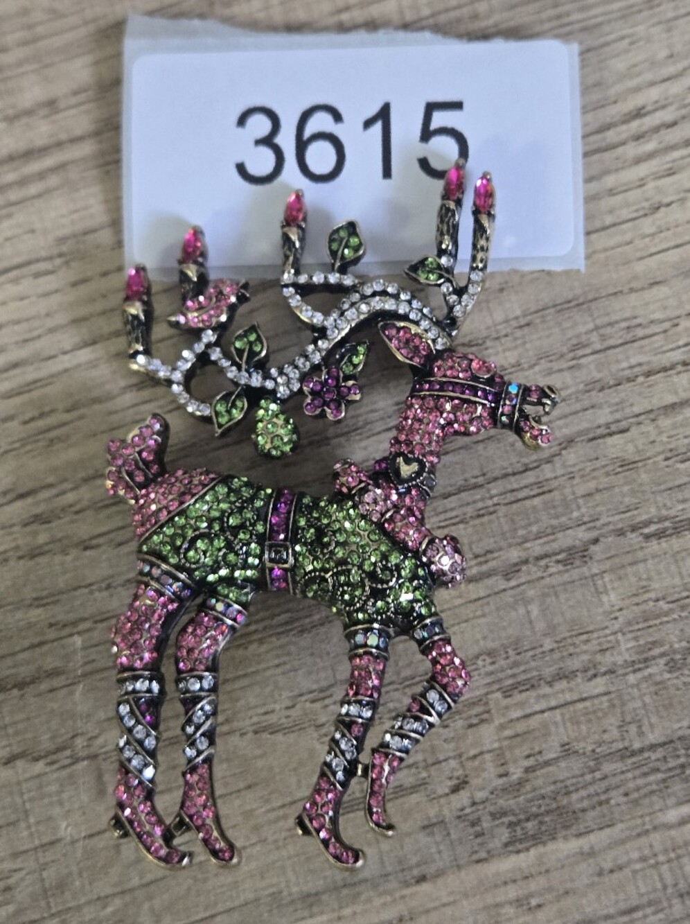 Heidi Daus "Dazzling Dancer" Brooch Festive Design Covered Pave Crystals